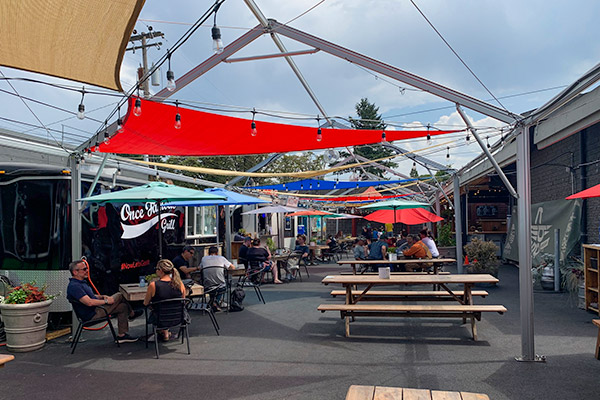 Cascade Full Strength tent for outdoor dining.