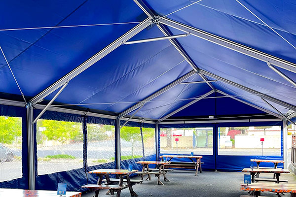 Cascade Full Strength Tent for outdoor dining.